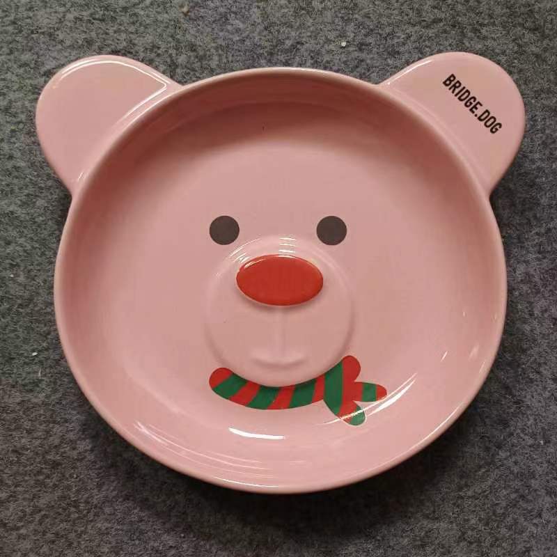 Pink Christmas Bear ceramic bowl with BRIDGE.DOG lettering on its ear