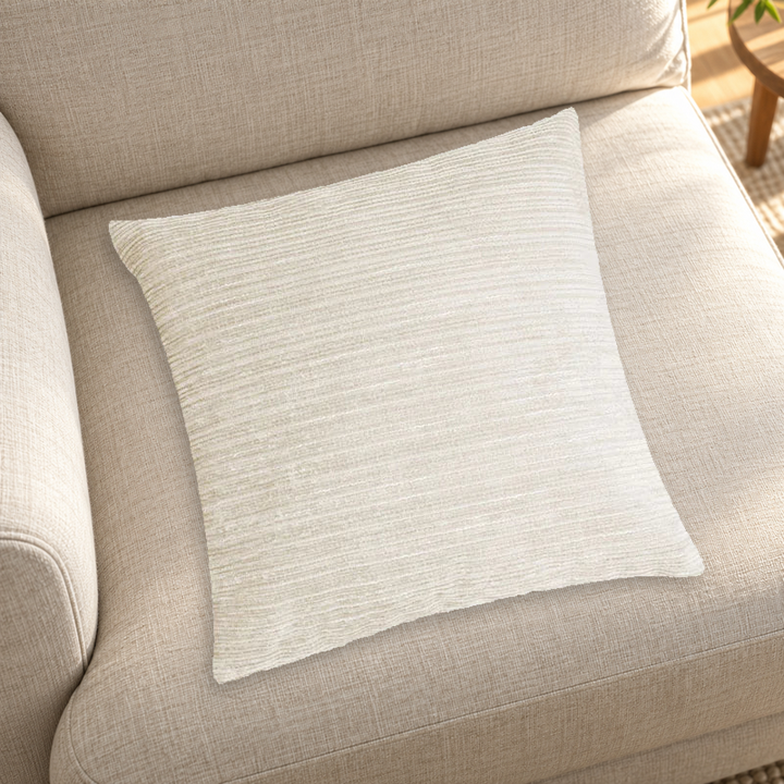 Beige striped chenille pillow color reference on a neutral sofa; insert inclusion is not specified