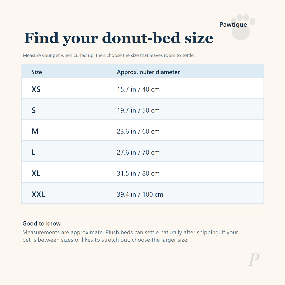 Pawtique CloudNest plush donut pet bed size guide with approximate outer diameters from XS to XXL