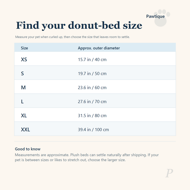 Pawtique CloudNest plush donut pet bed size guide with approximate outer diameters from XS to XXL