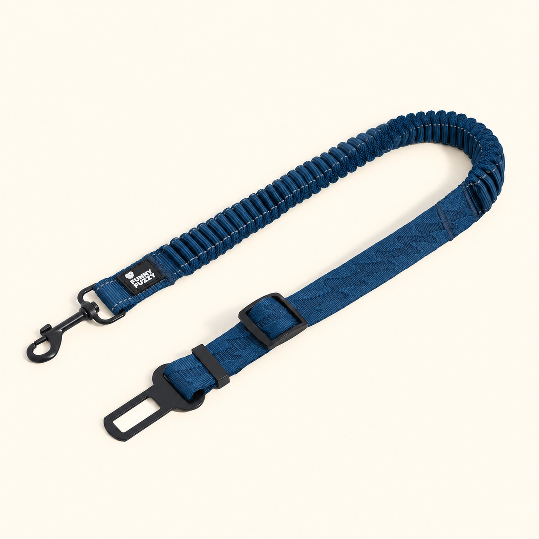 Navy CoolPaw dog car tether with patterned webbing, elastic section, swivel clip and seat-belt tongue