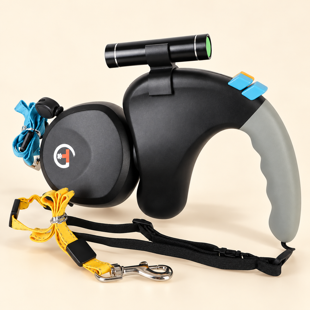 Black dual retractable dog leash with flashlight, blue and yellow leads, and wrist strap
