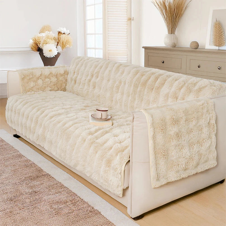 White sofa plush furniture cover in a naturally lit living room; furniture and props not included.