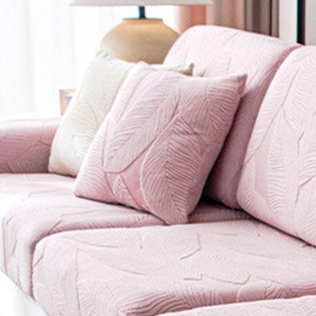 EverLeaf pink leaf-patterned pillow shown on a sofa; styling props are not the selected option contents.