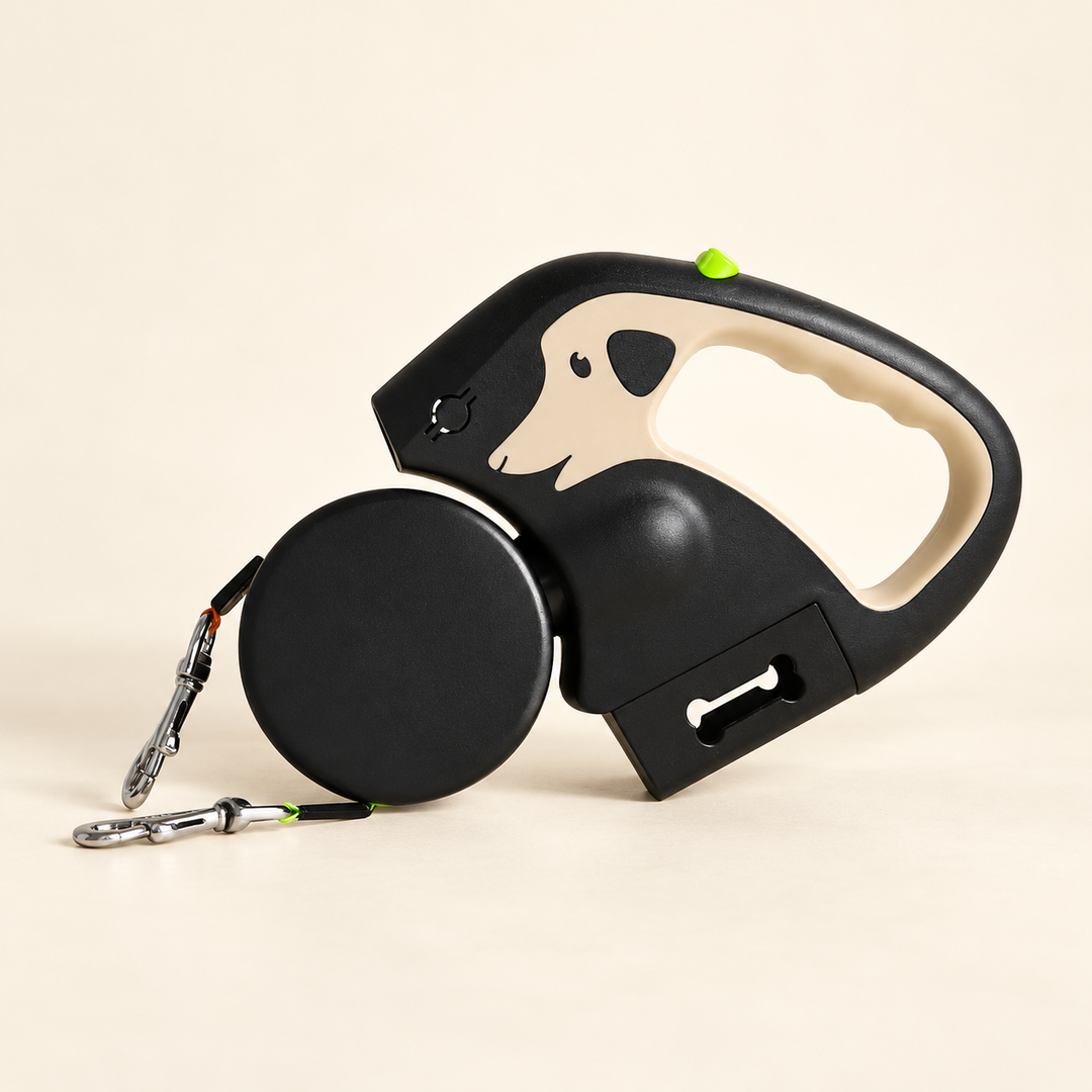 Khaki and black dual retractable dog leash with dog-shaped grip, two metal clips and waste-bag compartment on cream background