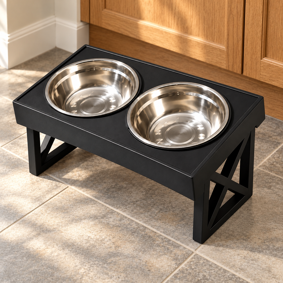 Black elevated stand with two empty stainless steel bowls, shown on a tiled kitchen floor.