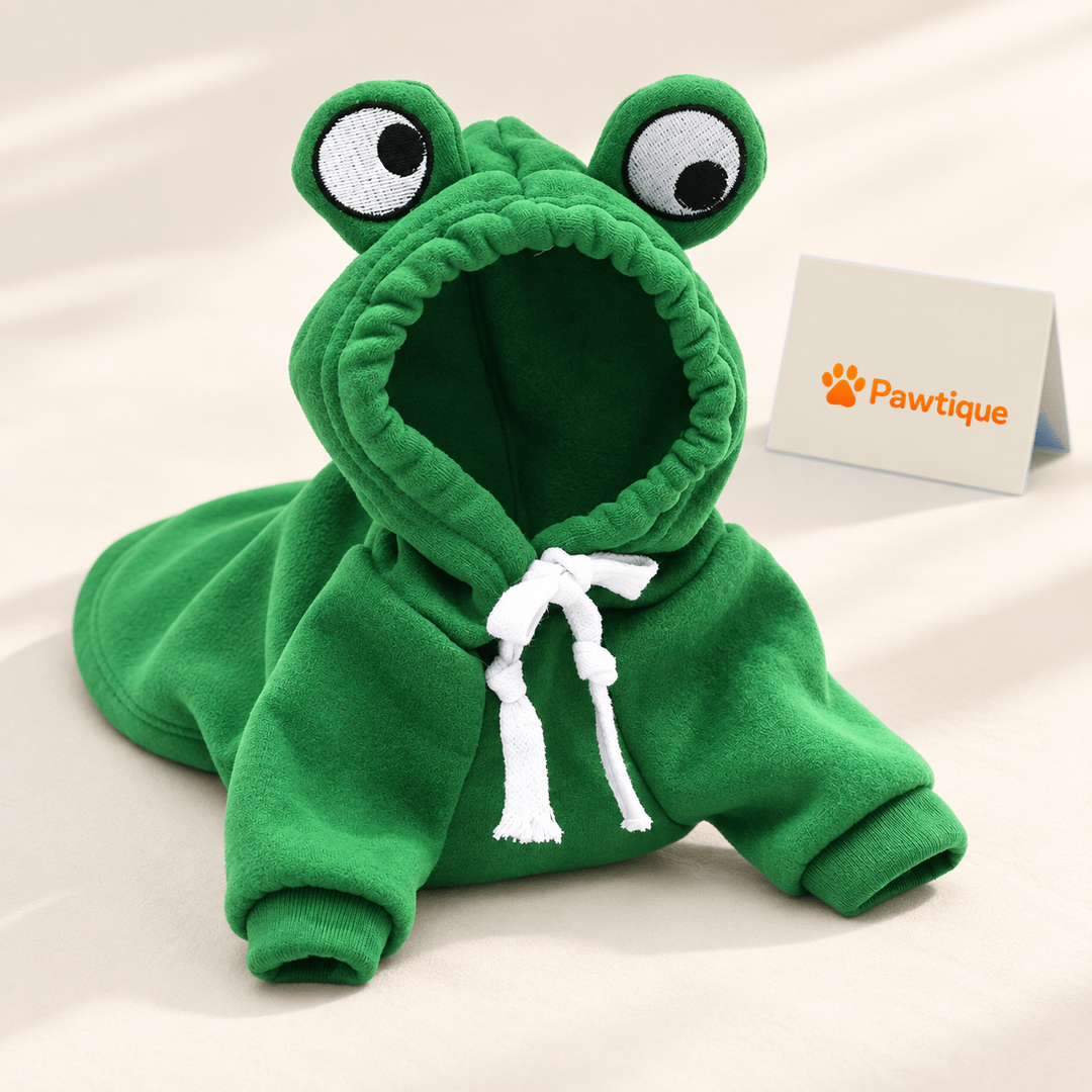 FrogHop green hoodie showing its raised frog-eye hood, white ties and ribbed cuffs.