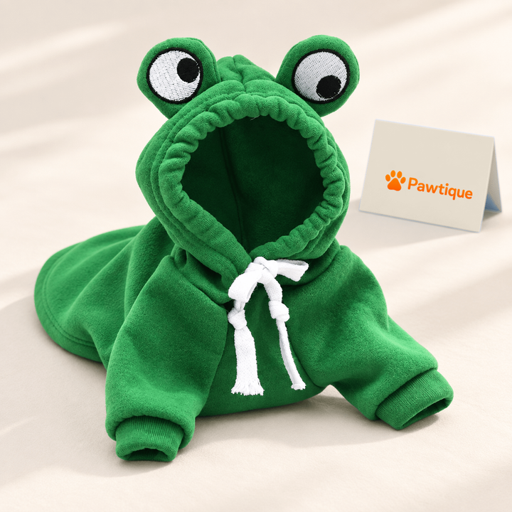 FrogHop green hoodie showing its raised frog-eye hood, white ties and ribbed cuffs.