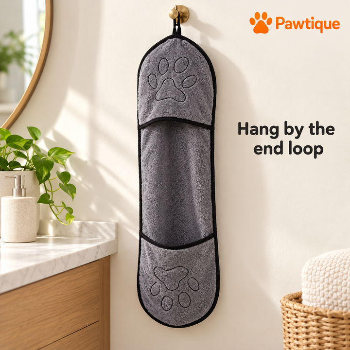 Gray double-pocket drying towel stored by its end hanging loop