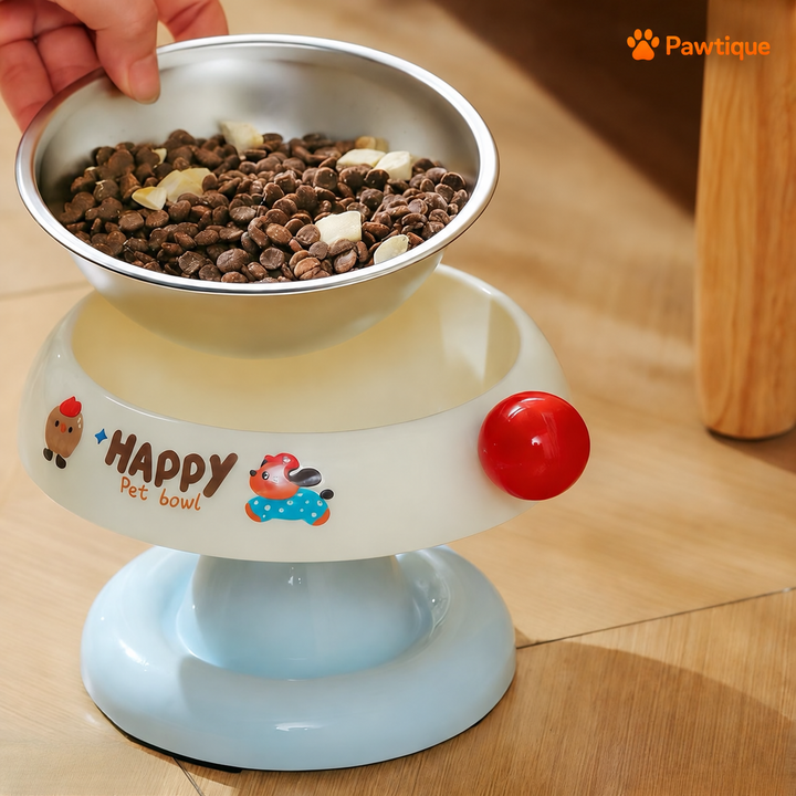The stainless steel insert lifts out of the White bowl holder.