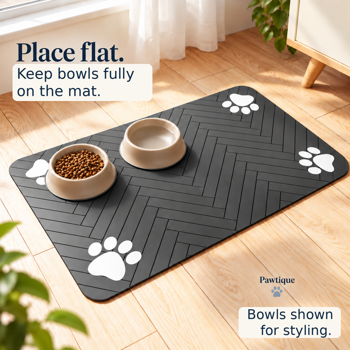 Two cream styling bowls on a dark-gray herringbone feeding mat with enlarged guidance to place it flat and keep bowls fully on the mat.