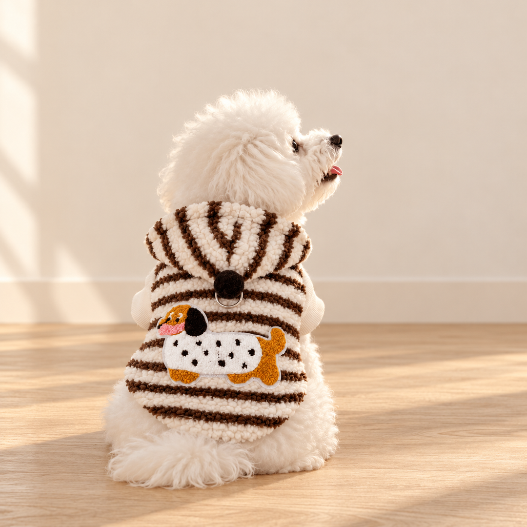 Black style Doxie Stripe hoodie worn by a seated white dog, showing striped fleece and spotted dachshund applique