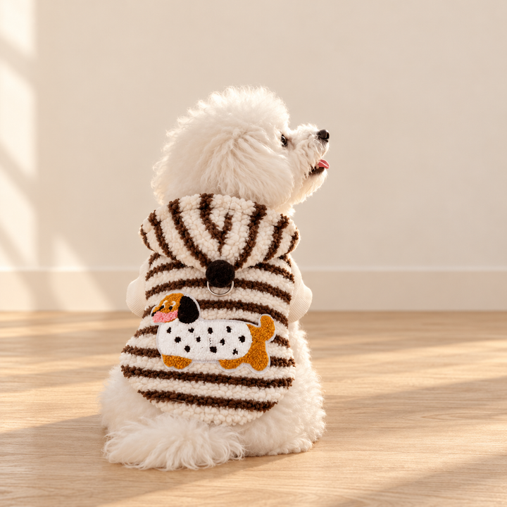 Black style Doxie Stripe hoodie worn by a seated white dog, showing striped fleece and spotted dachshund applique
