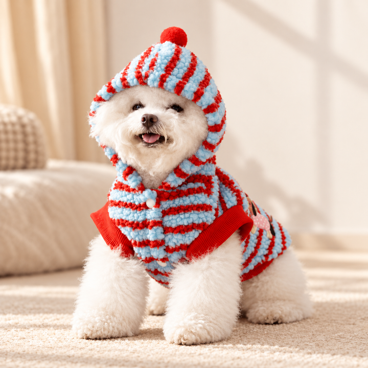 Red Doxie Stripe fleece hoodie worn with the pom-pom hood up by a small white dog