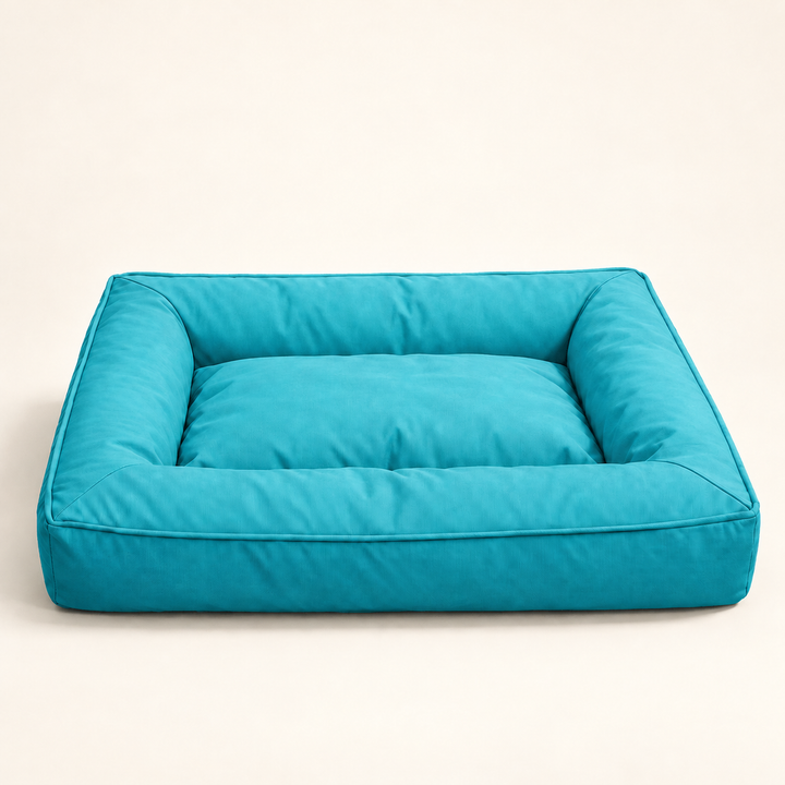 Pawtique PatioNest lagoon teal water-resistant bolster dog bed