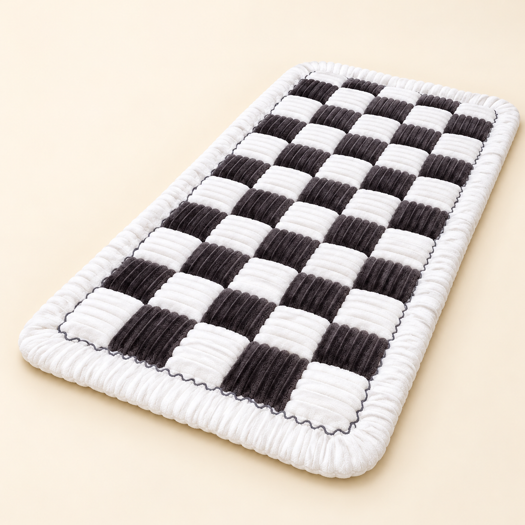 Black and white checkerboard Pawtique Plush Comfort Pad on cream background
