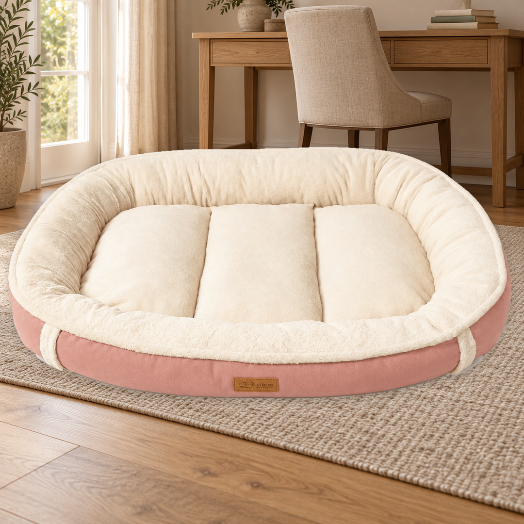 Pink Plush Bolster dog bed with a cream raised rim and segmented center