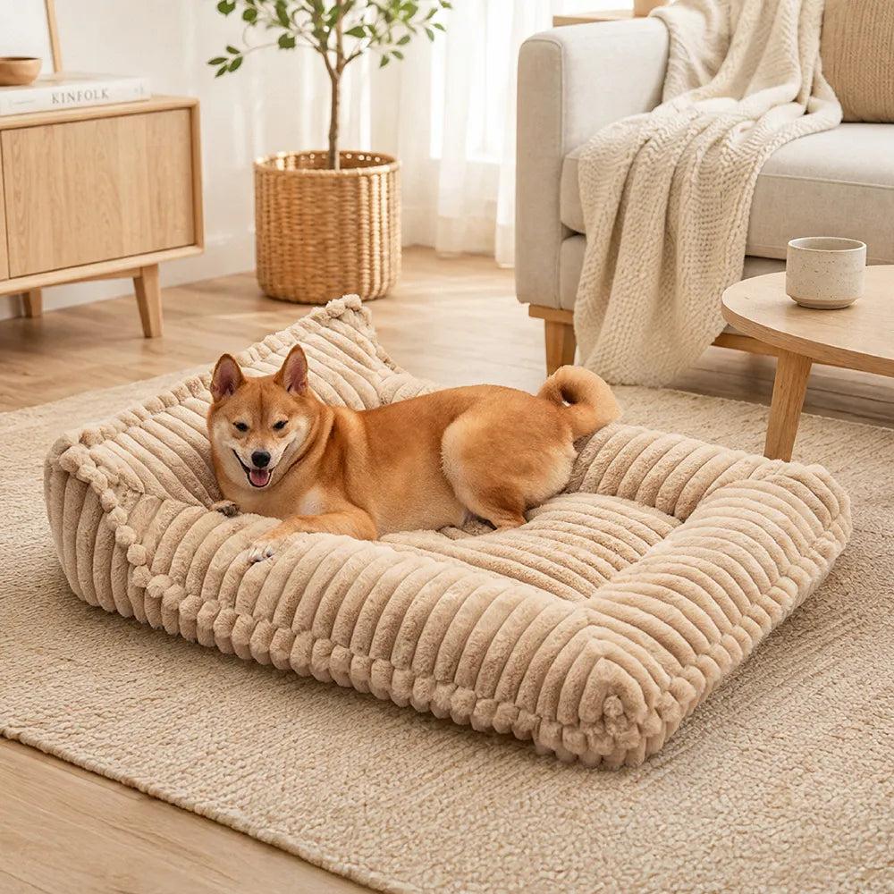 Dog resting in the khaki ribbed bolster bed