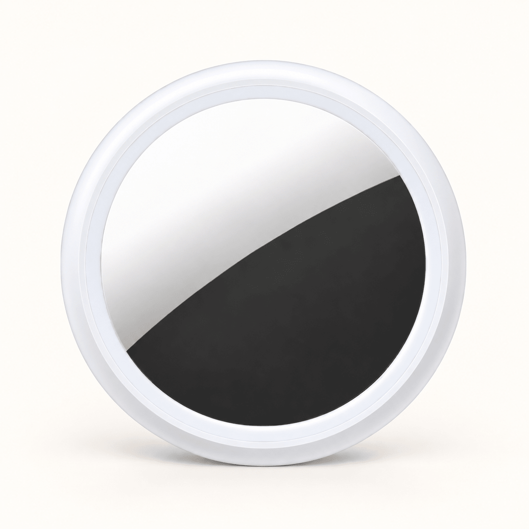 One white circular S10 Bluetooth item finder on a warm cream background