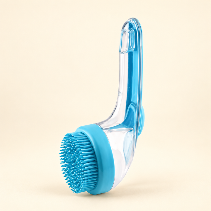 One Blue Pawtique shampoo-dispensing pet bath brush on a warm cream background