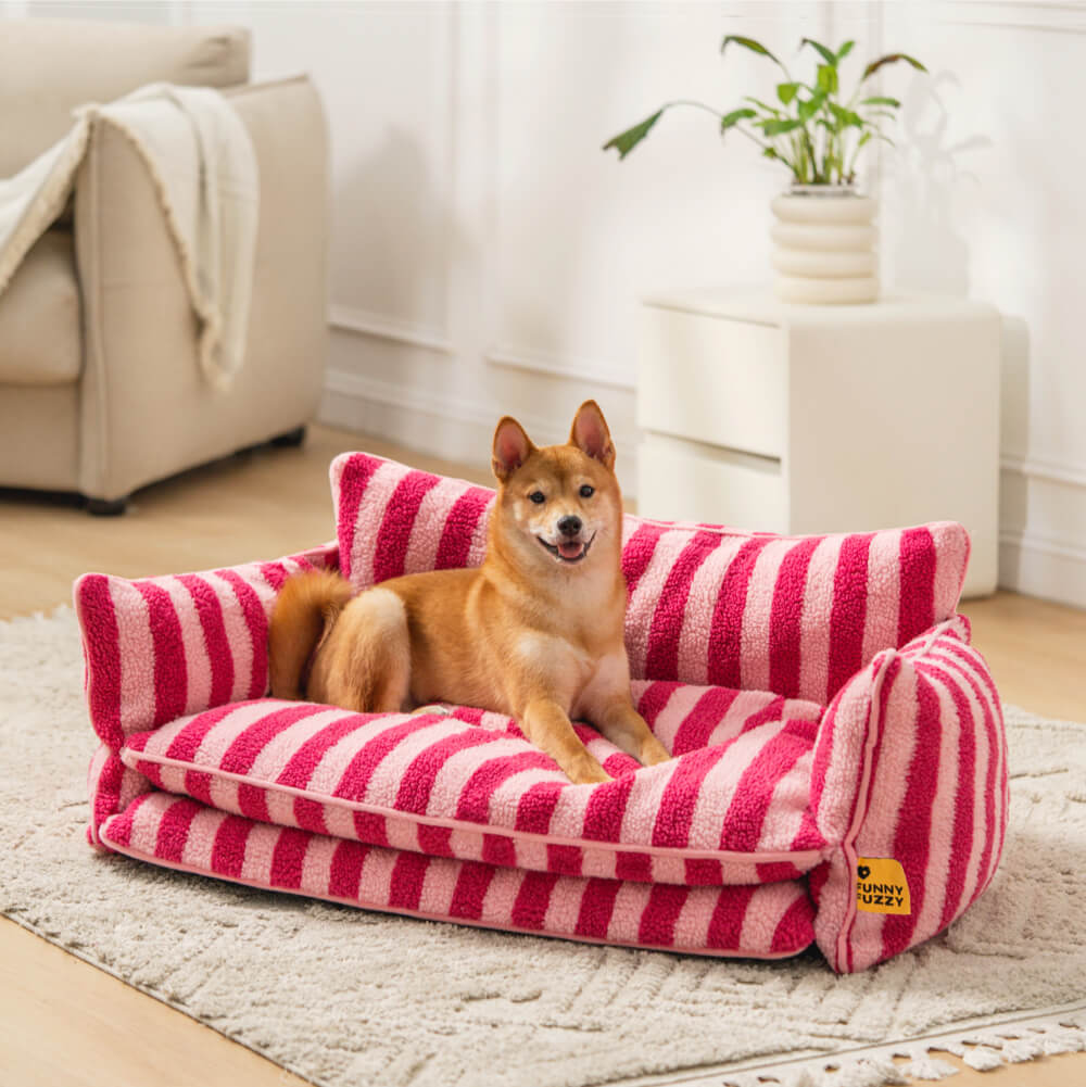 Authentic Rose Stripe sofa bed with original yellow FUNNYFUZZY sewn label; pet shown for context