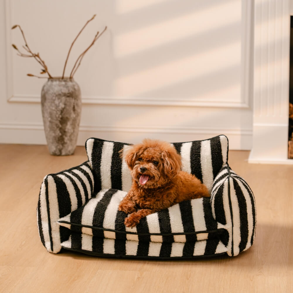 Classic Black Stripe StripeNest pet sofa bed with a dog in a natural room