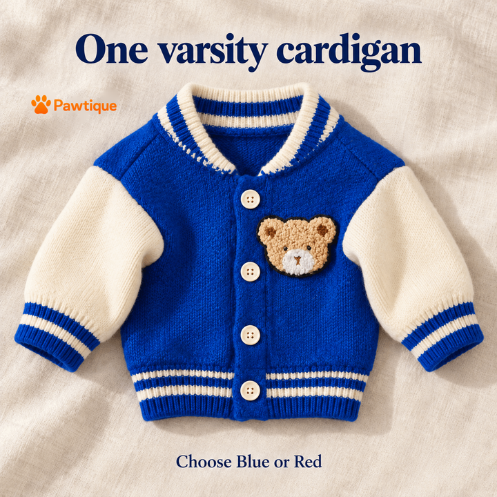 One Blue Varsity Bear cardigan shown flat with cream sleeves and bear applique.