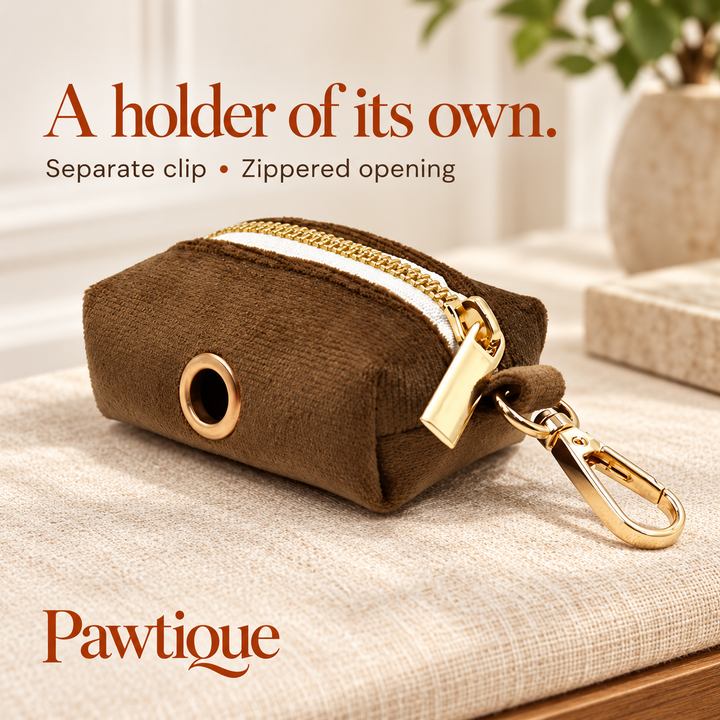 Separate brown velvet waste-bag holder with white zipper tape, dispensing eyelet and gold-tone clip